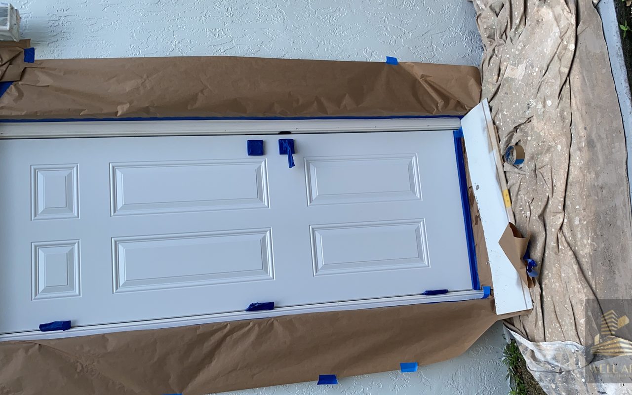 After — crisp white door, same angle